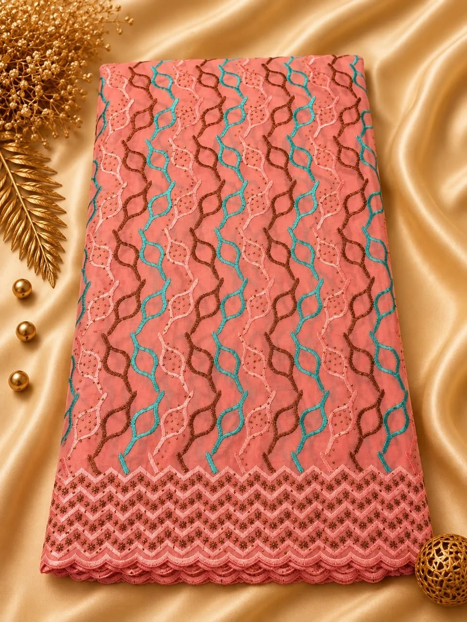 Brodé géométrique – Corail